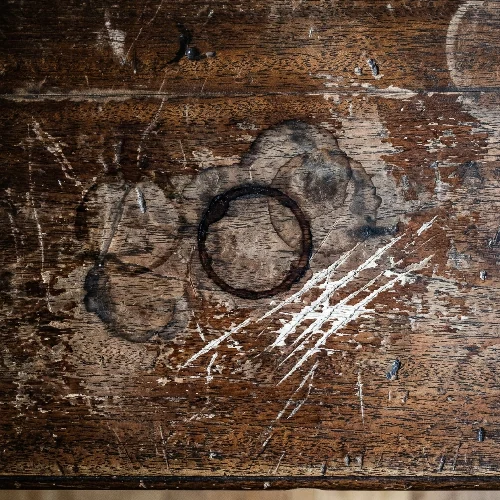 Damaged mahogany table surface